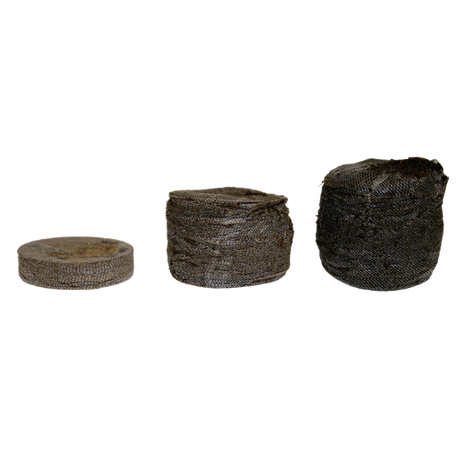 Originale Jiffy Torfquelltabletten im trockenen Zustand vor dem Aufquellen, ideal für die Anzucht von Samen und Stecklingen.